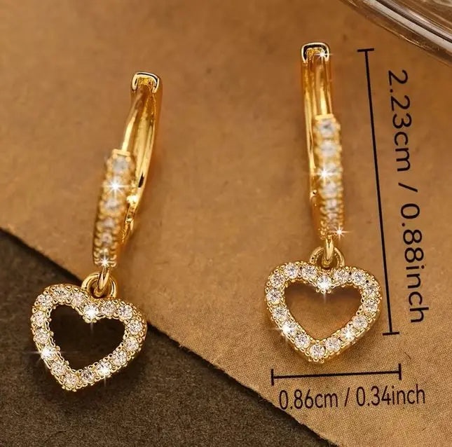 Goldene Herz-Creolen - Funkelnde Zirkonia Ohrringe - Elegant Moeller