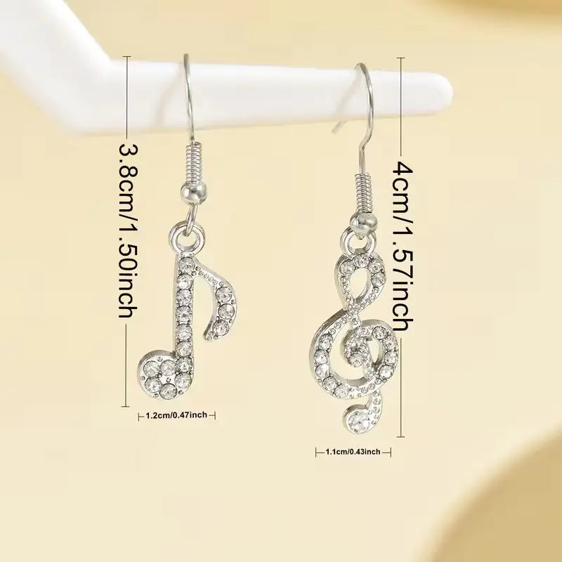 Goldene Musiknoten-Ohrringe mit Strass Moeller